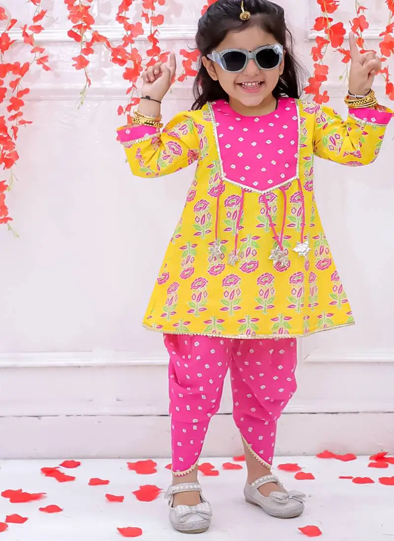 Yellow printed cotton peplum kurti and dhoti for girls