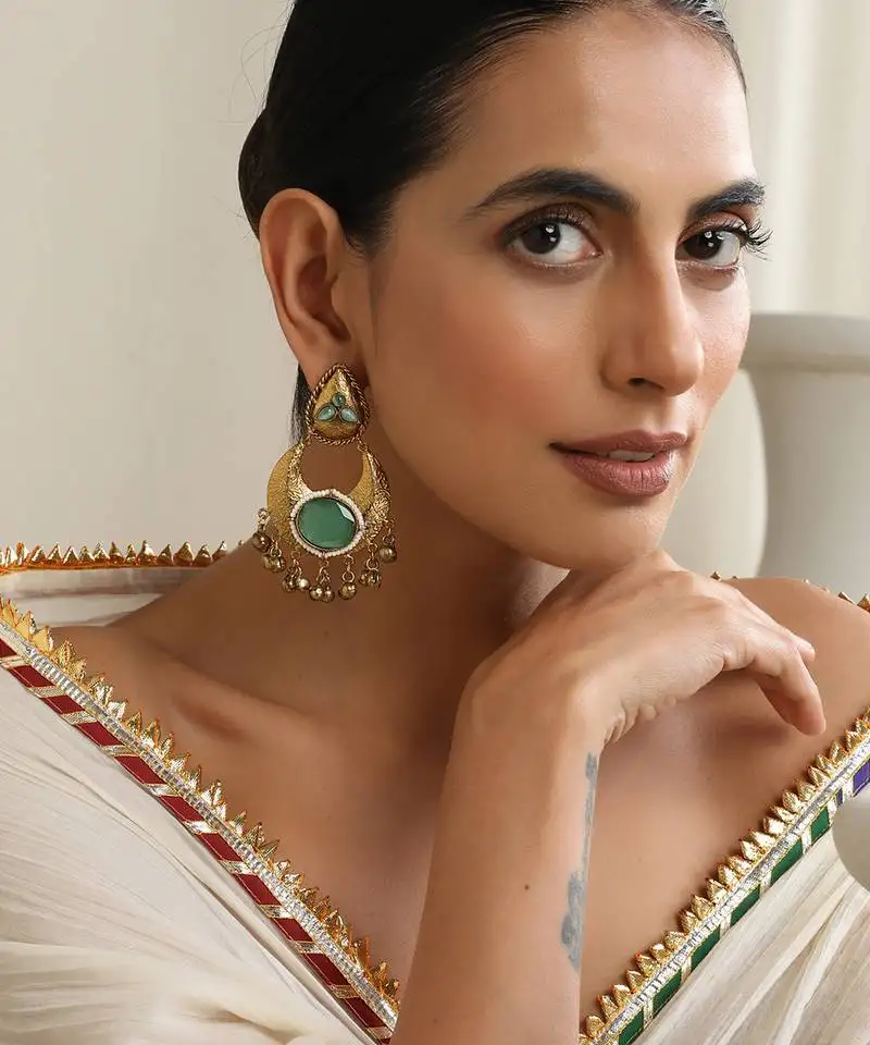 Gold plated blue stone dangler earrings