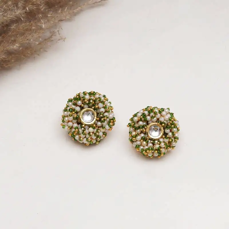 Gold tone green & white garden of pearl kundan earrings
