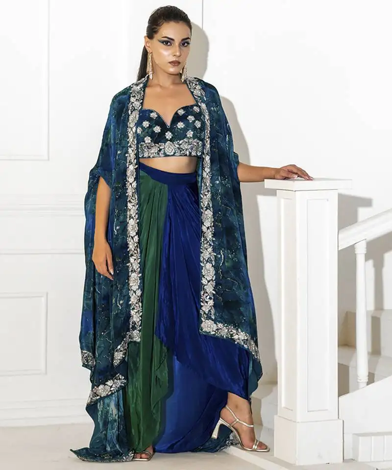 Blue crepe plain lehenga with embroidered blouse and cape