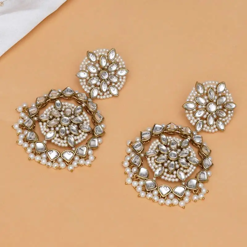Handcrafted kundan flower stud earrings with pearl fringe