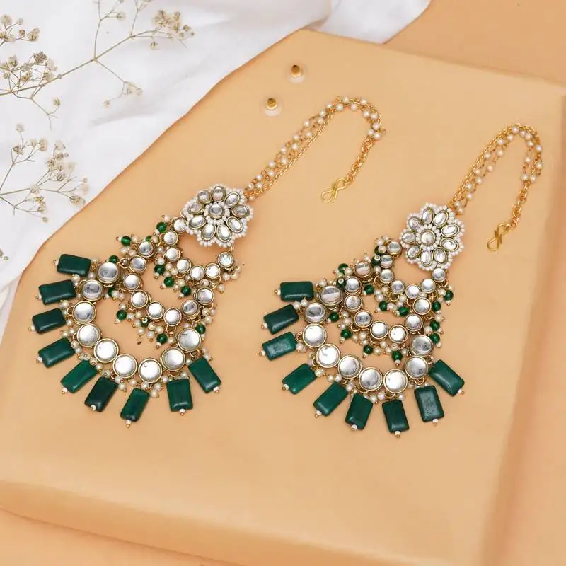 Traditional kundan chandelier earrings with green stones