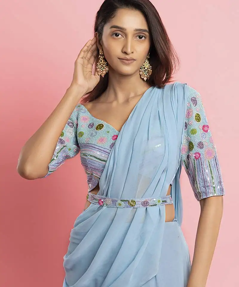 Light blue georgette plain saree with embroidered blouse & belt