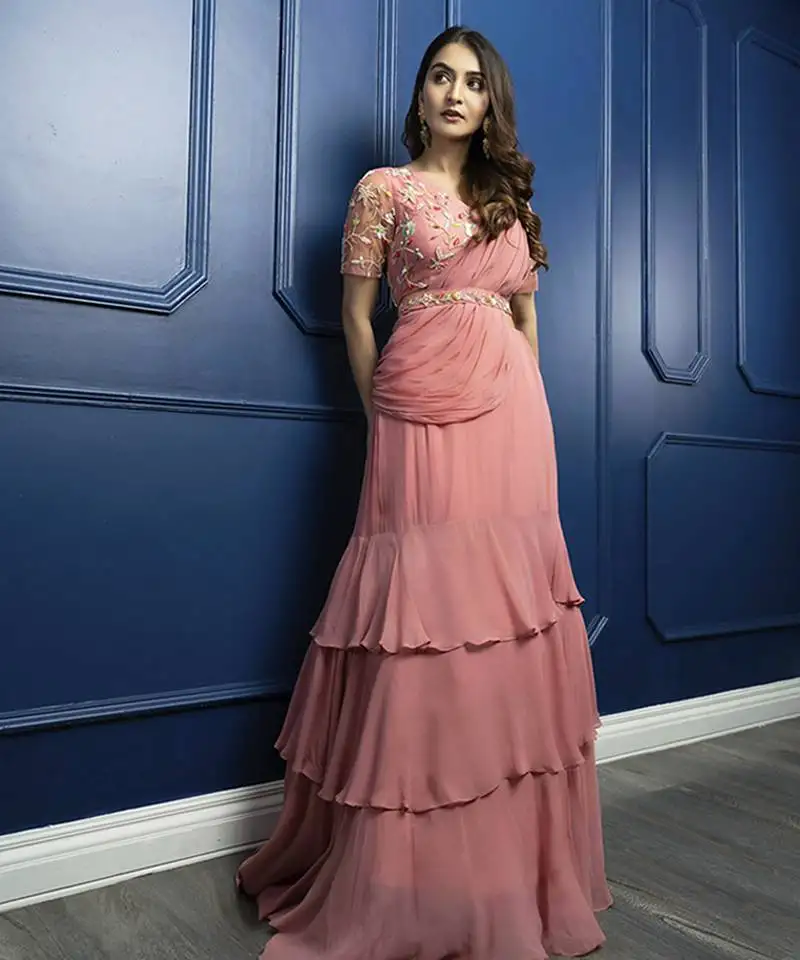 Pink georgette plain saree with embroidered blouse & belt