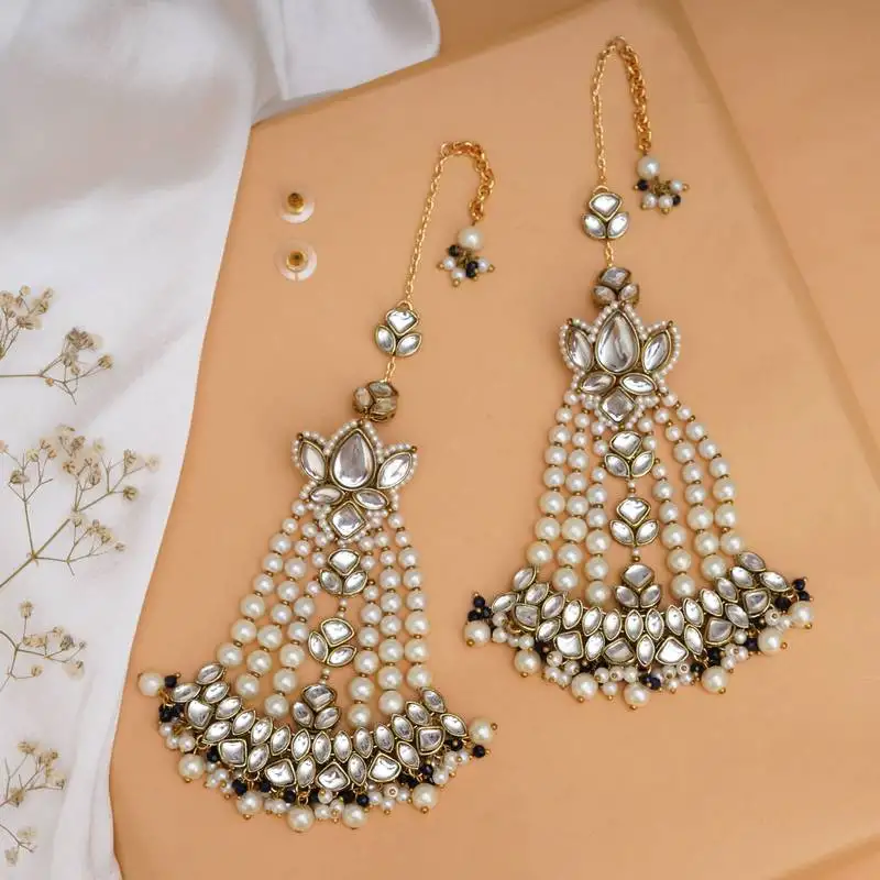 Floral kundan chandbali with pearl drapes earrings