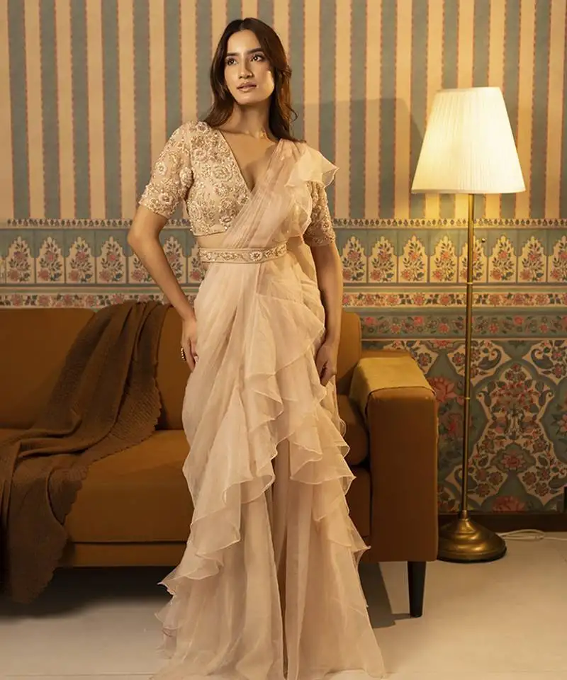 Beige organza plain saree with embroidered blouse & belt