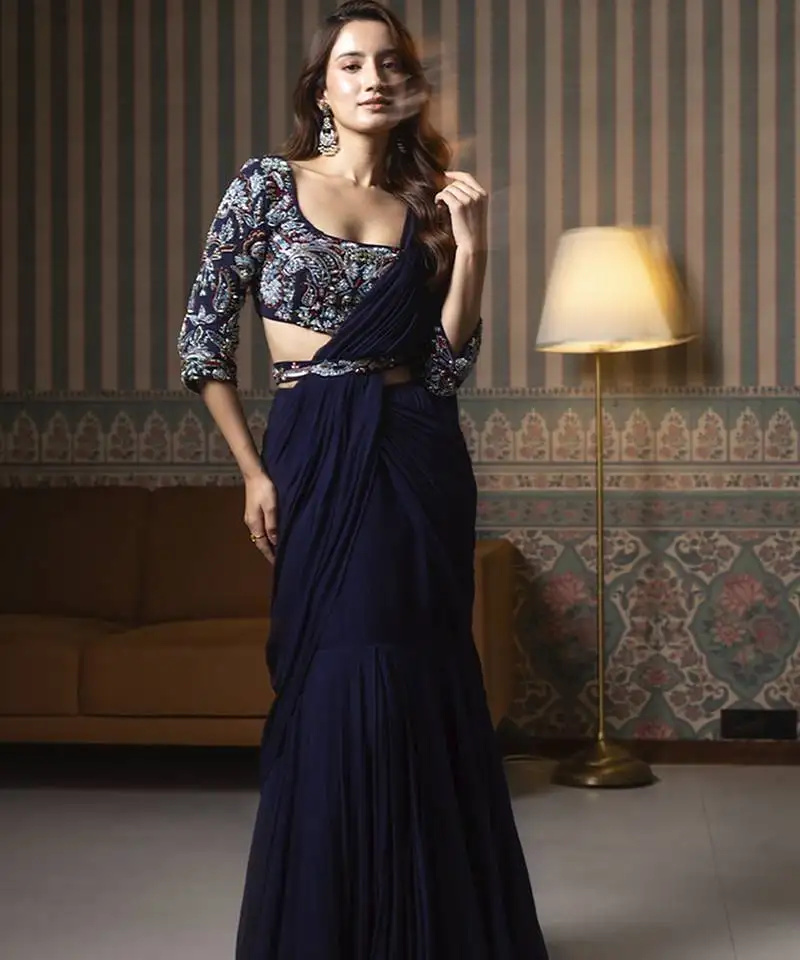 Navy blue georgette plain saree with embroidered blouse & belt