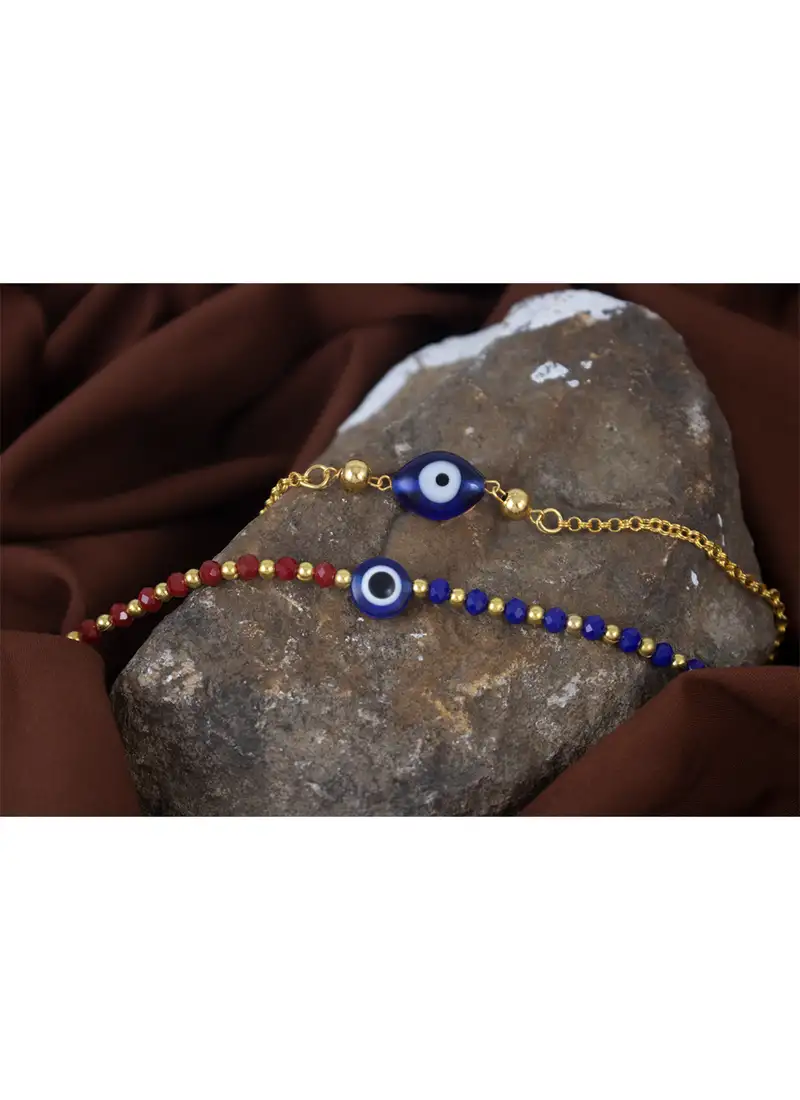 Combo of handcrafted evil eye unisex rakhi with gold and blue beaded design for bhaiya bhabhi