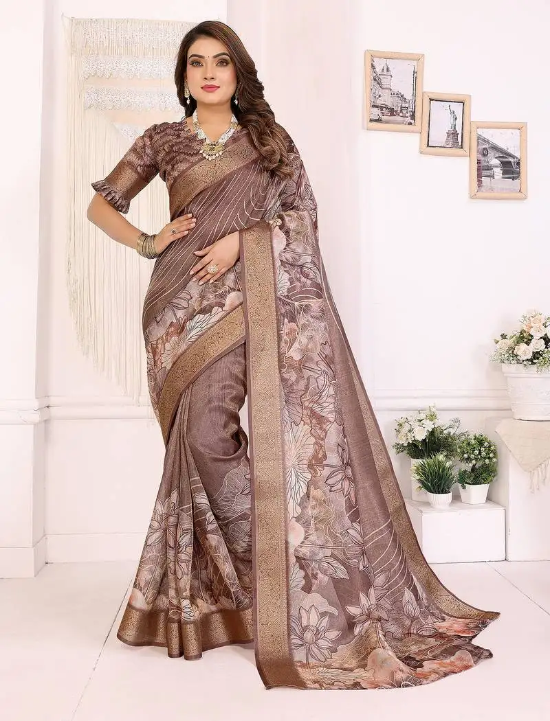 Primarily brown soft tissue silk floral digital printed saree with zari jacquard weaving border