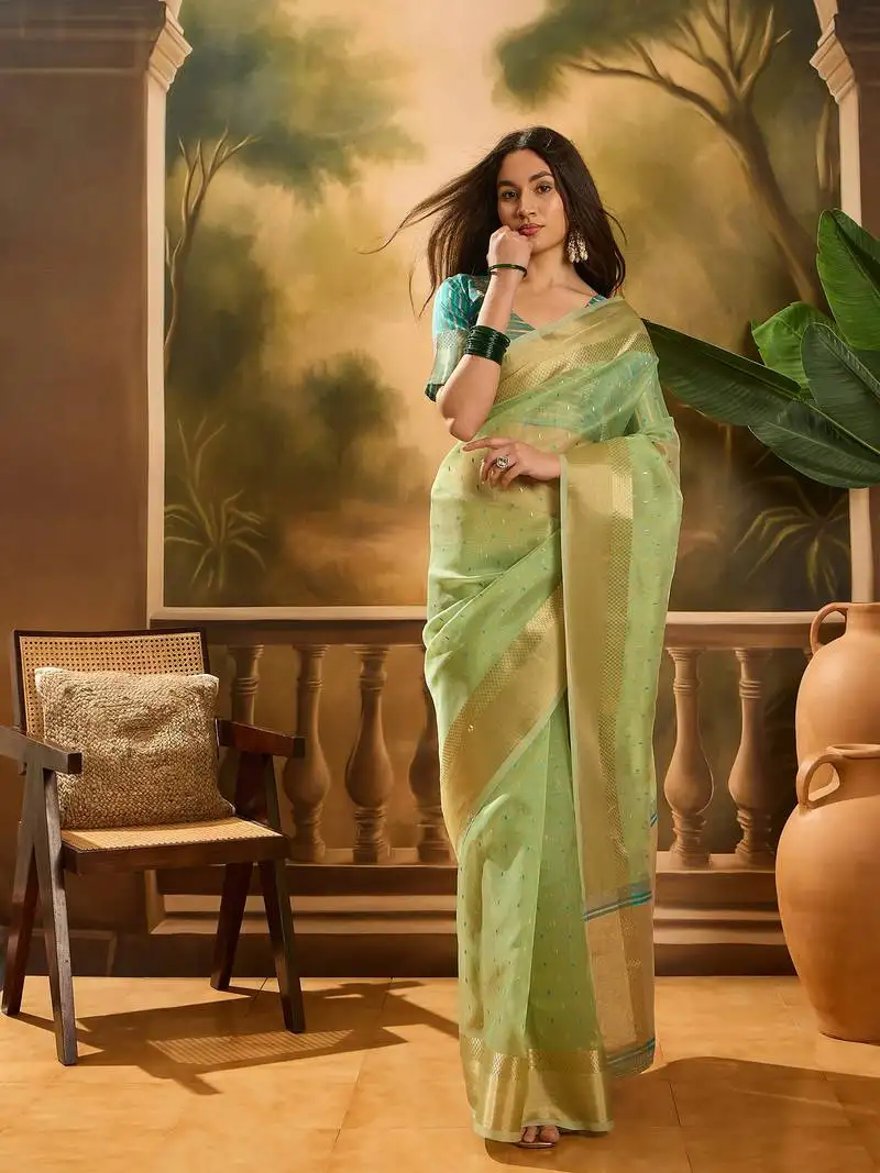 Sea green organza jacquard saree with unstitched blouse piece