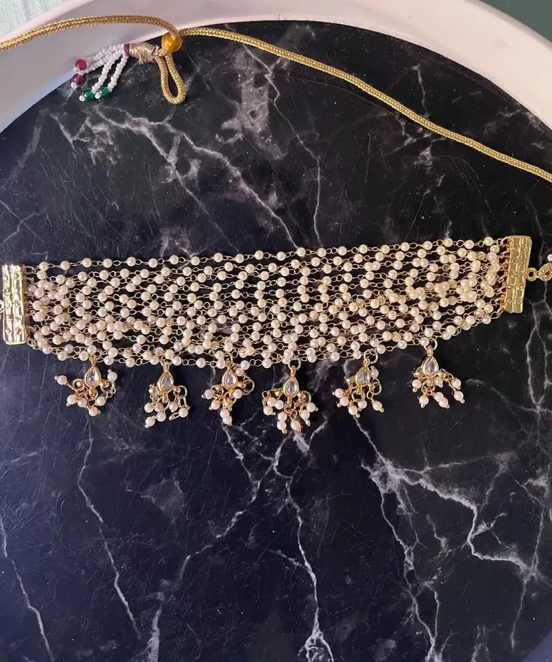 Green embroidered resham zari sequins organza lehenga