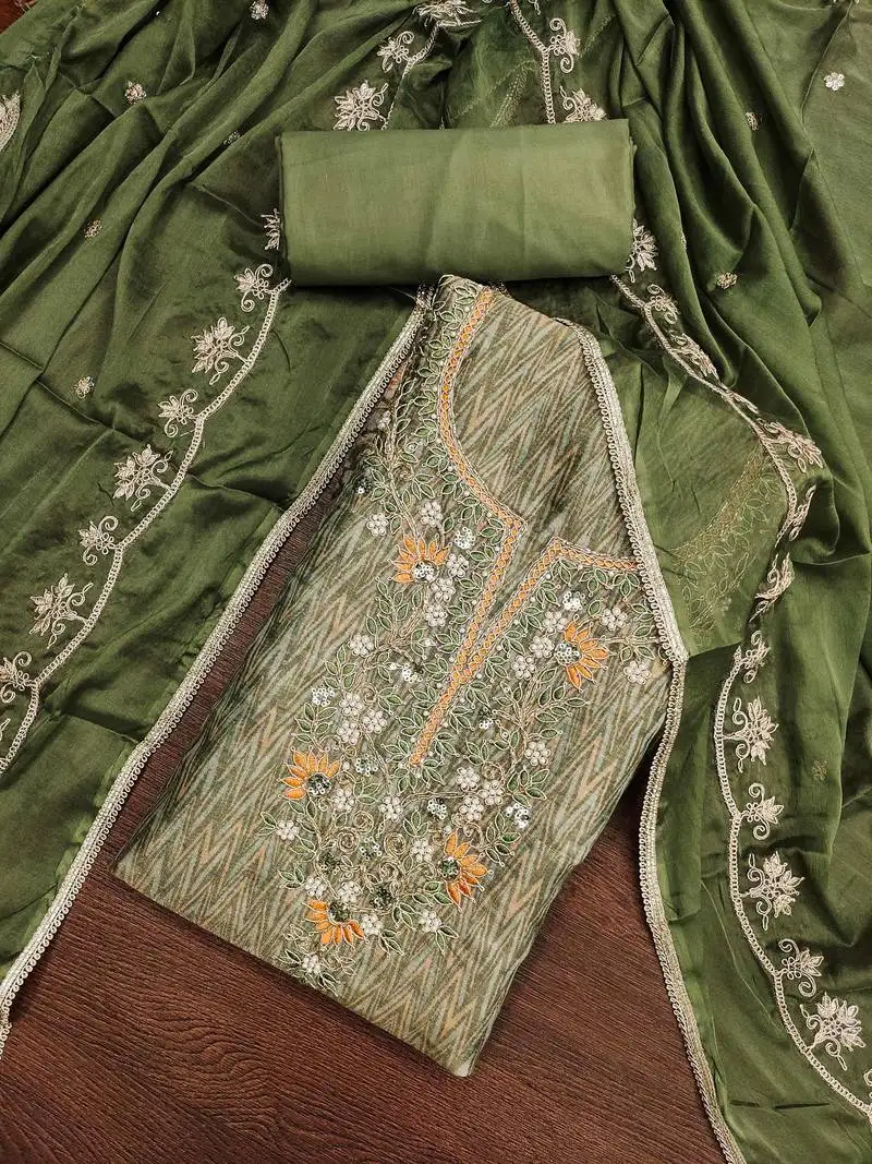 Women's green embroidered work dress material unstitched