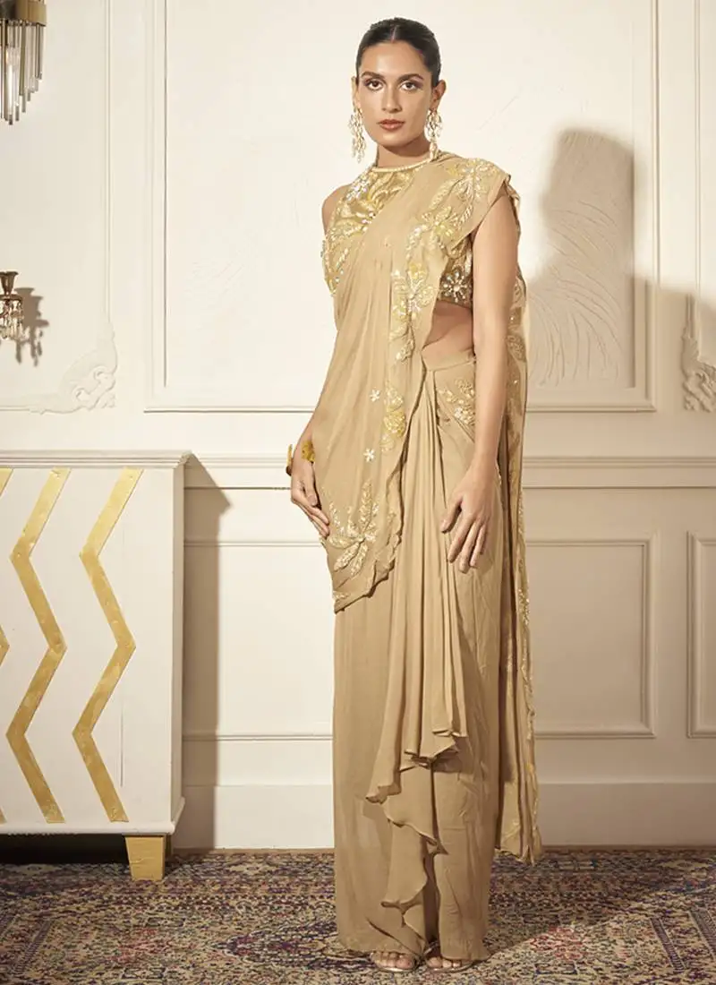 Gold georgette embroidered saree with blouse
