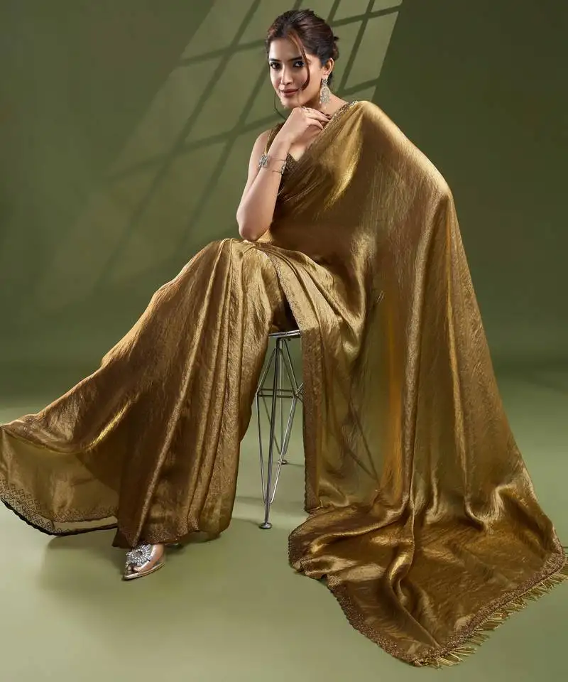 Women's gold silk blend swaroski work saree with unstitched blouse piece