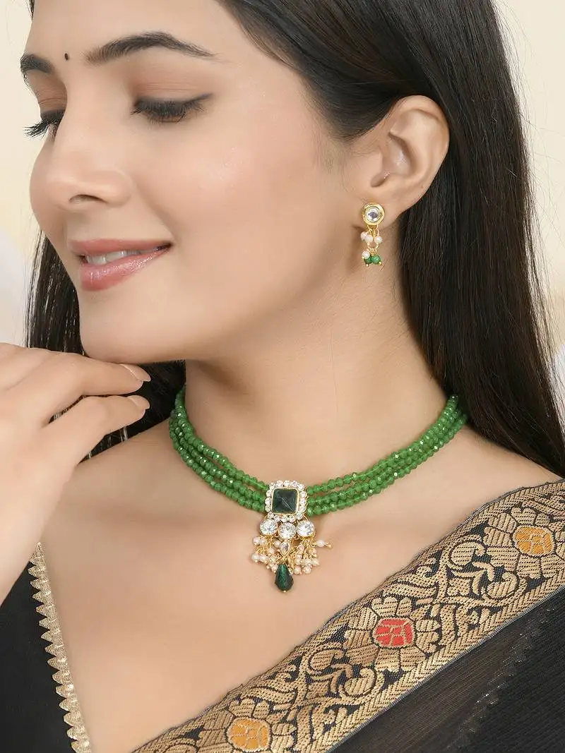 "green beaded kundan necklace set with pearl drops