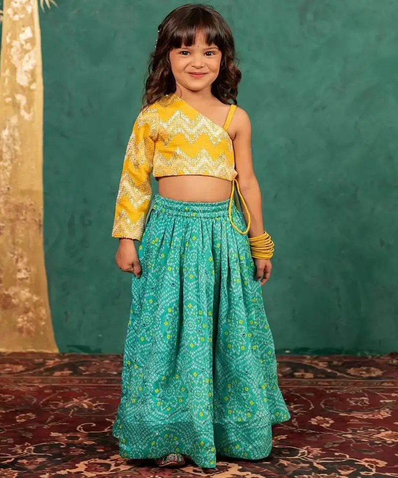 Girls one shoulder yellow top with bandhni mirror work lehenga (set of 2)
