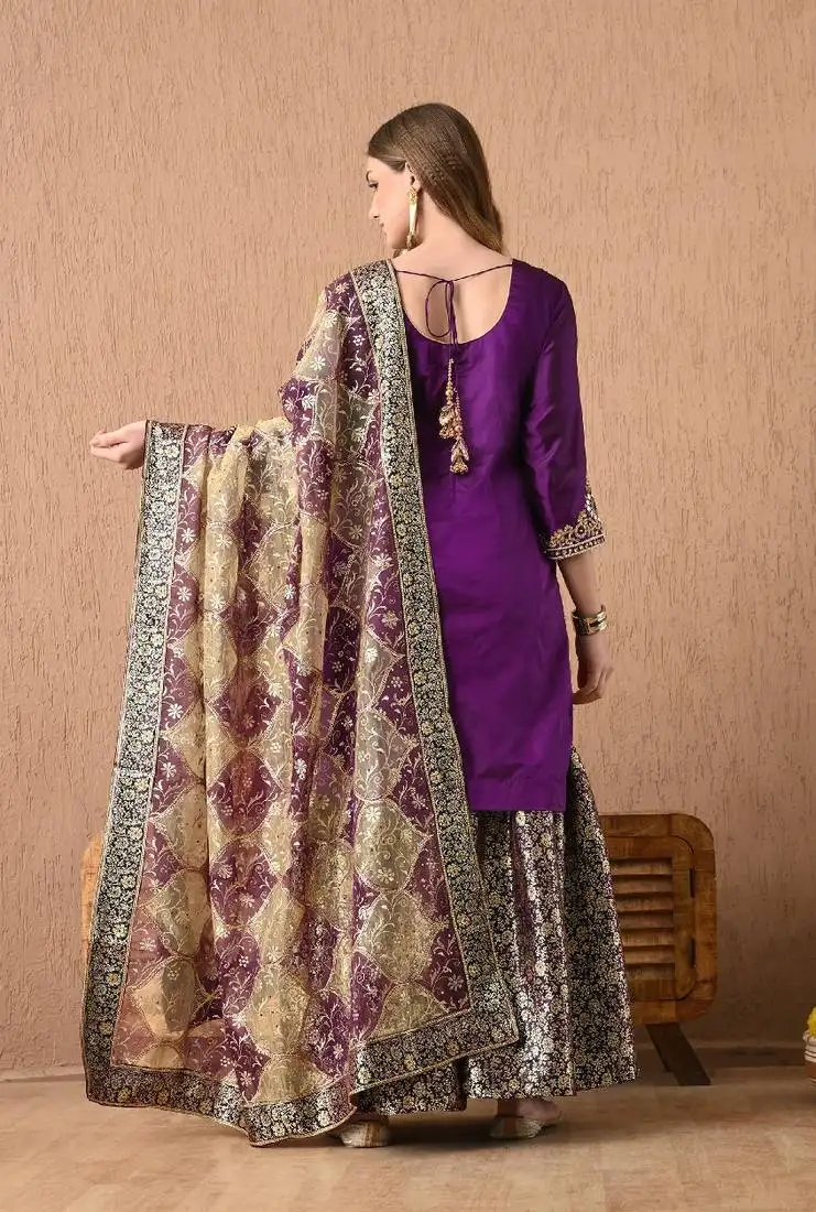 Graceful purple sharara set with gotta zardozi and pearl work