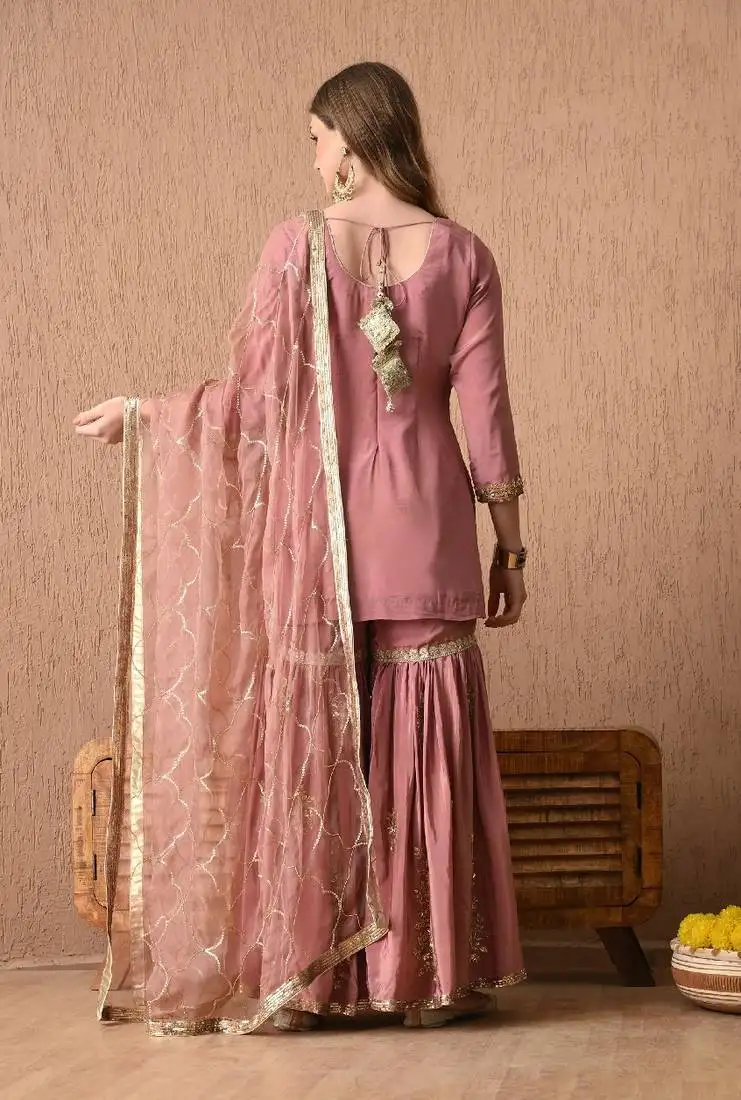 Beige peach kurta set with zardozi and sequins work