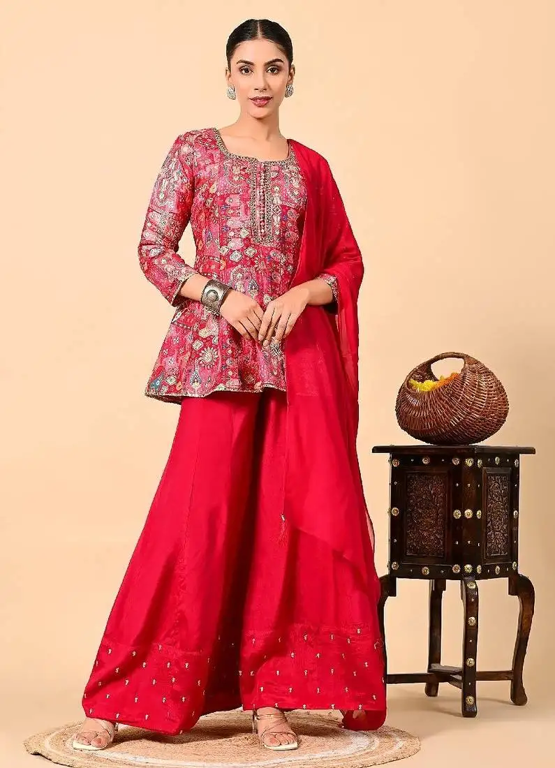 Reddish pink sharara set with peplum on kurta and thread work