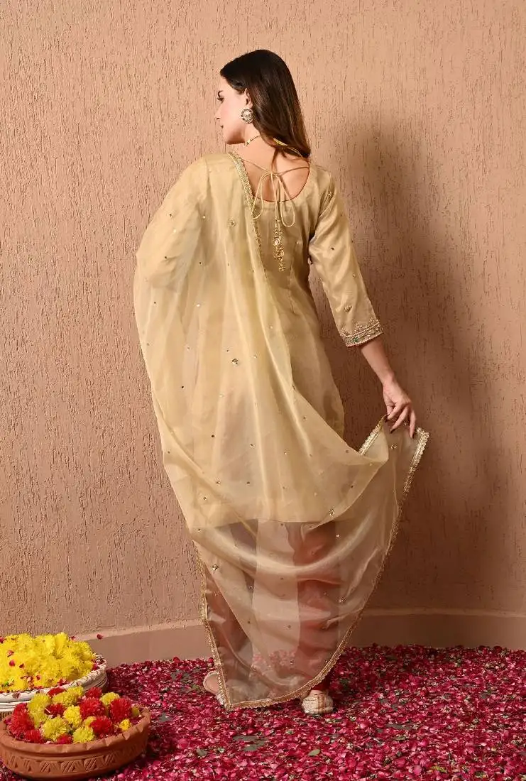 Golden green kurta set with zardozi dabka thread and sequins work
