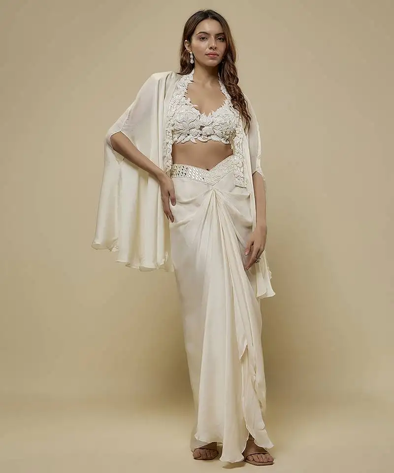 White satin plain cape and skirt paired with emobroidered blouse