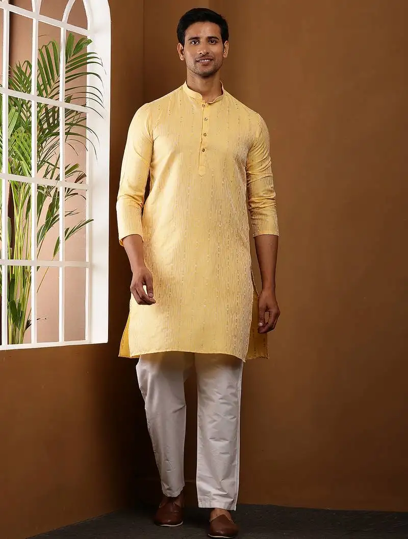 Men yellow embroidered kurta with white pyjama set