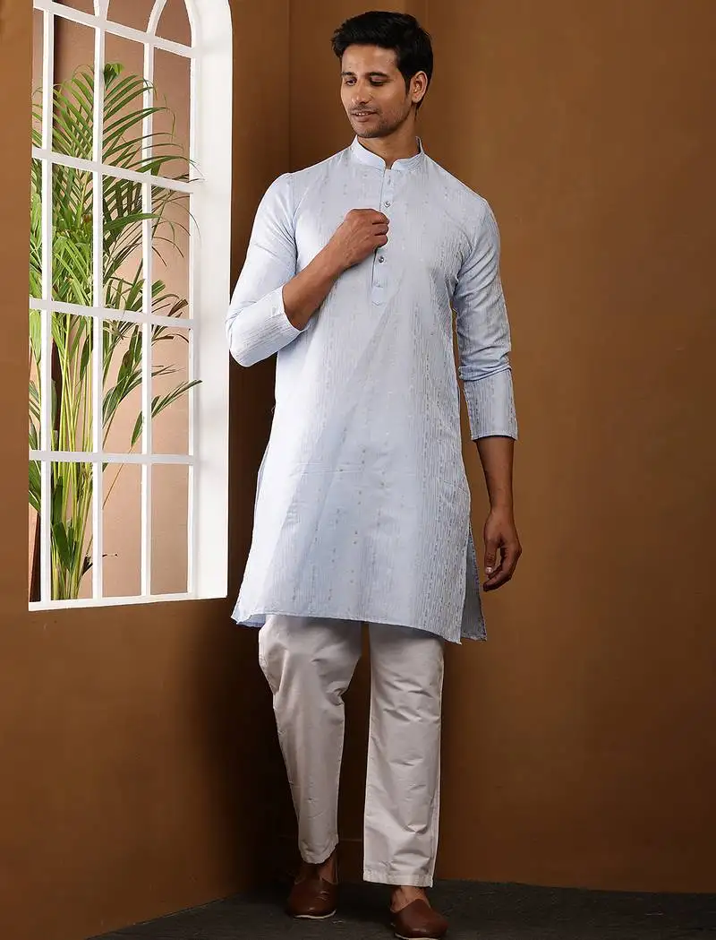Men's light blue textured kurta with white churidar