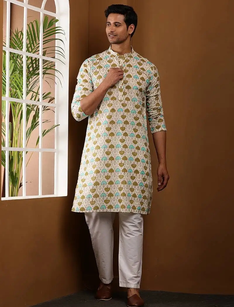 Men's cream printed festive kurta with white churidar