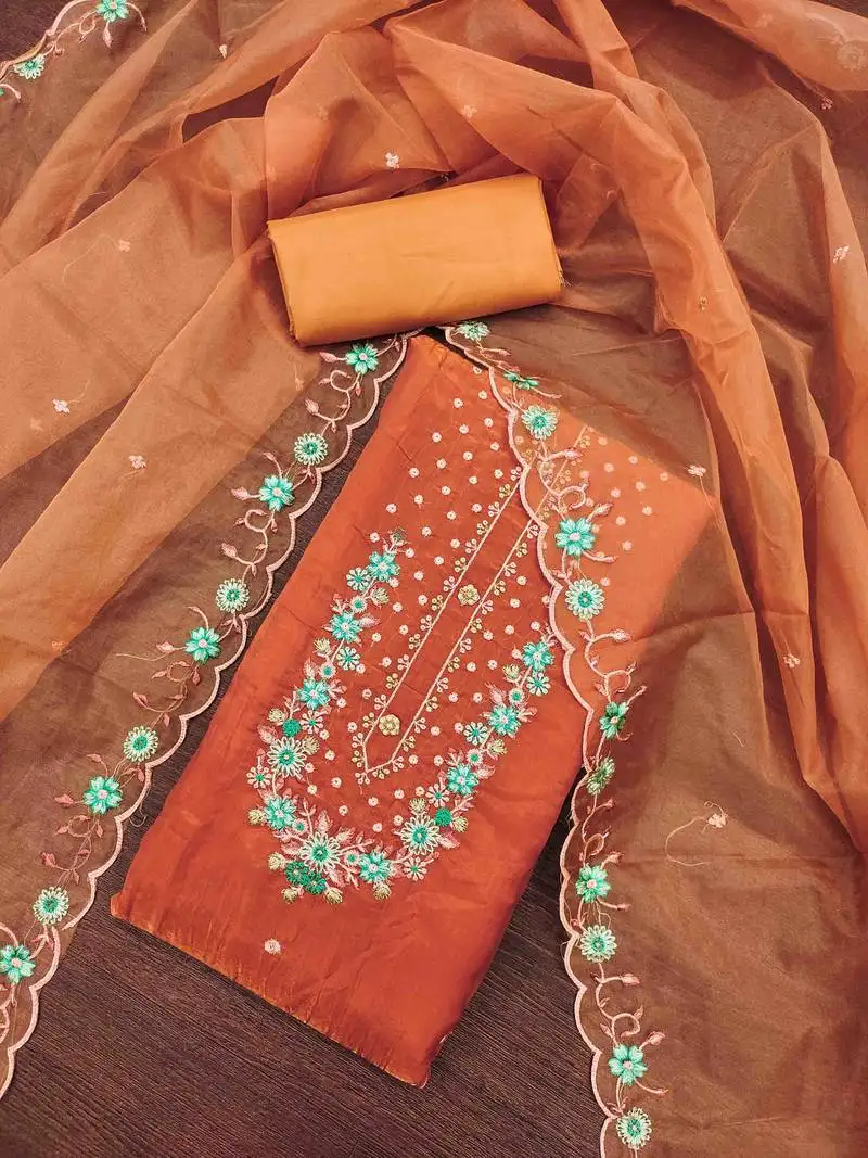 Women's rust handwork dress material unstitched