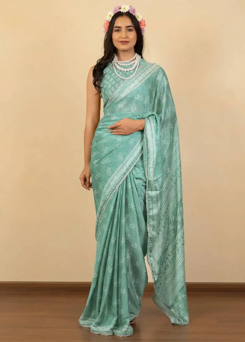 Dusty teal chiffon floral print zari work golden lace saree with unstitched blouse piece