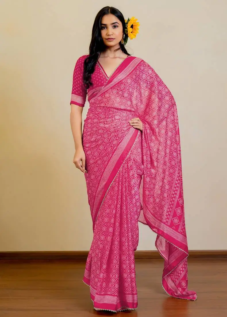 Bright pink chiffon bandhani checks print lace border saree with unstitched blouse piece