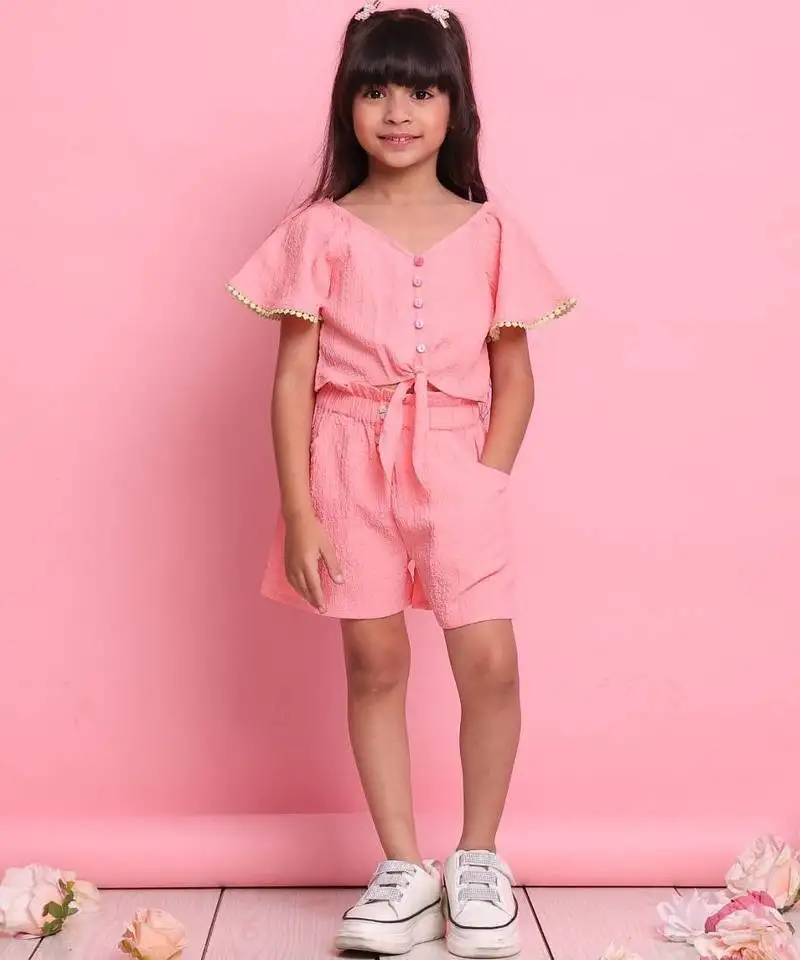 Girls' peach co-ord set front-knot short sleeve top with matching shorts
