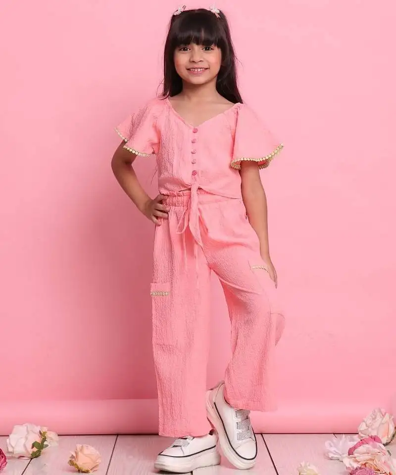 Girls' peach co-ord set front-knot button top & relaxed trousers