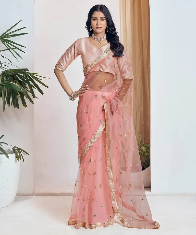 Peach embroidered net saree with unstiched blouse