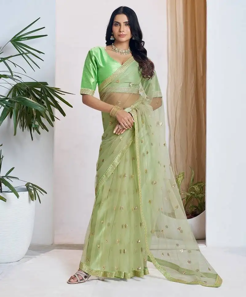 Light green embroidered net saree with unstiched blouse