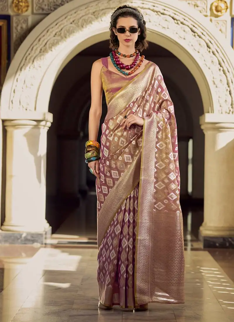 Light peach tissue art silk with zari weaving wedding wear saree