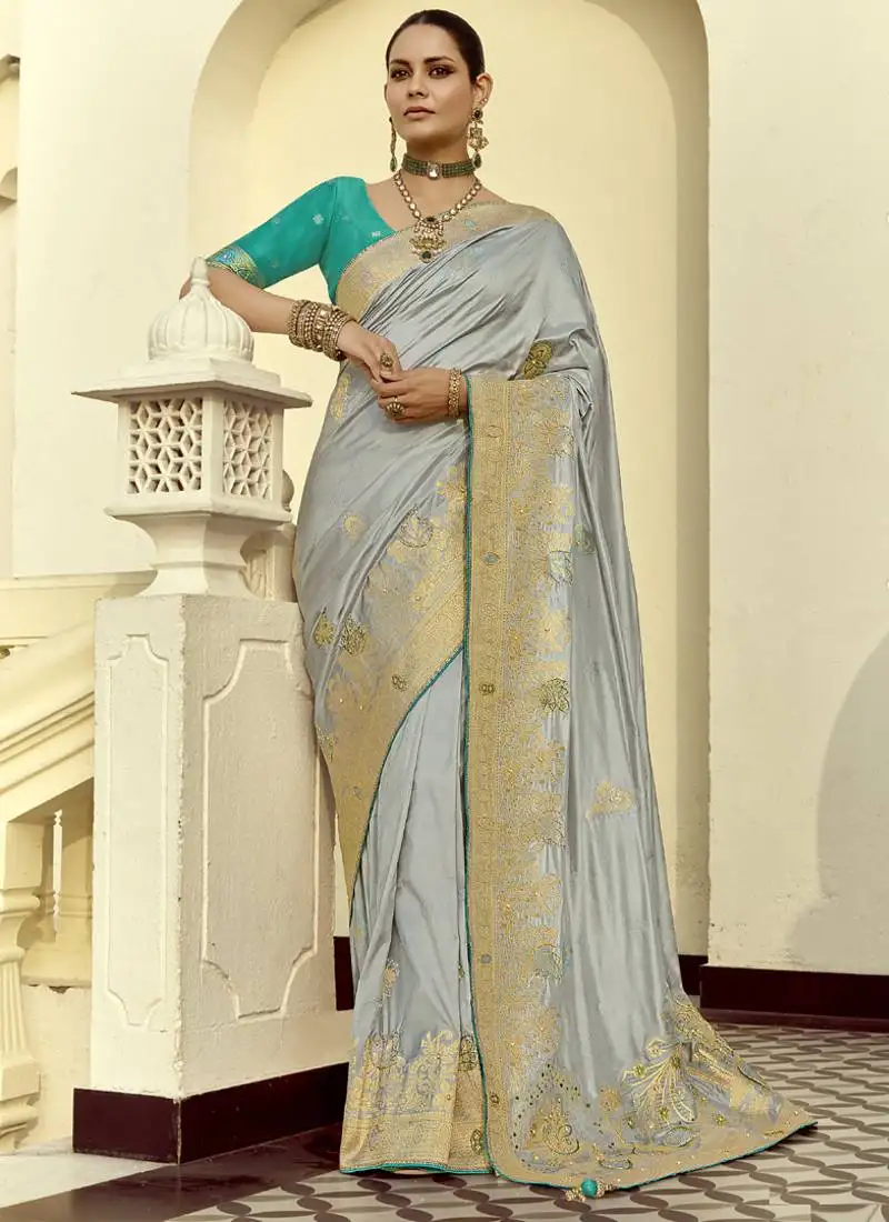 Light gray dola silk heavy zari weaving cut dana work and designer contrast blouse wedding sarees