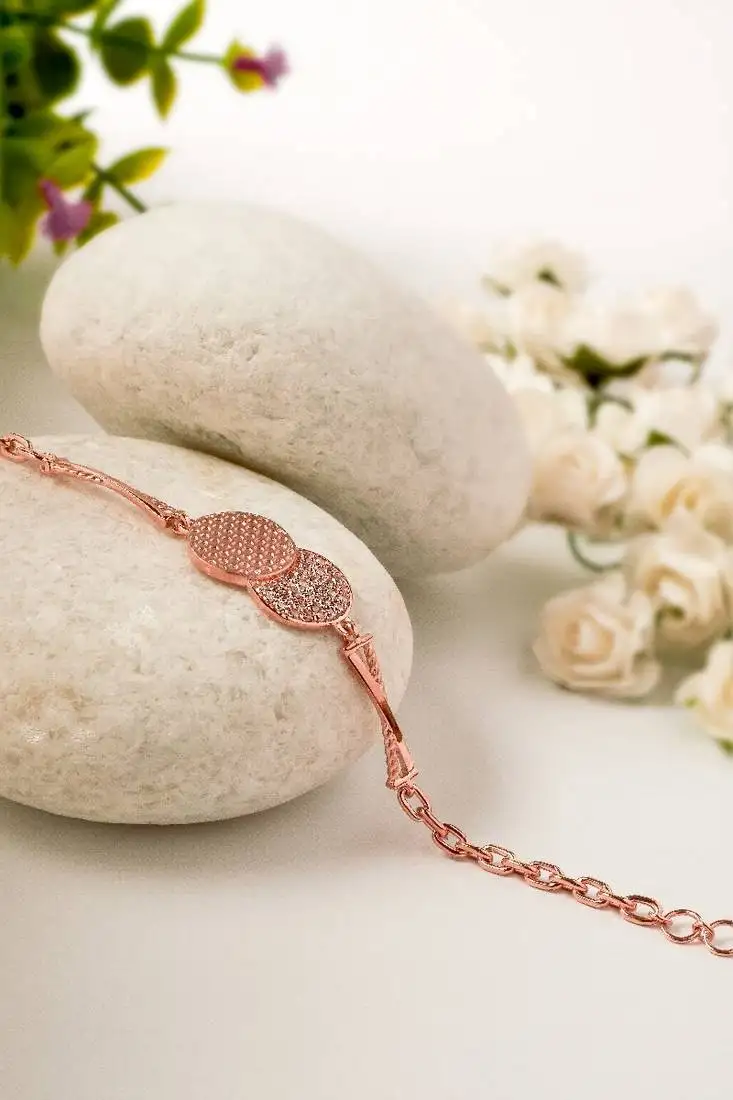 Rose gold sterling silver merging bracelet