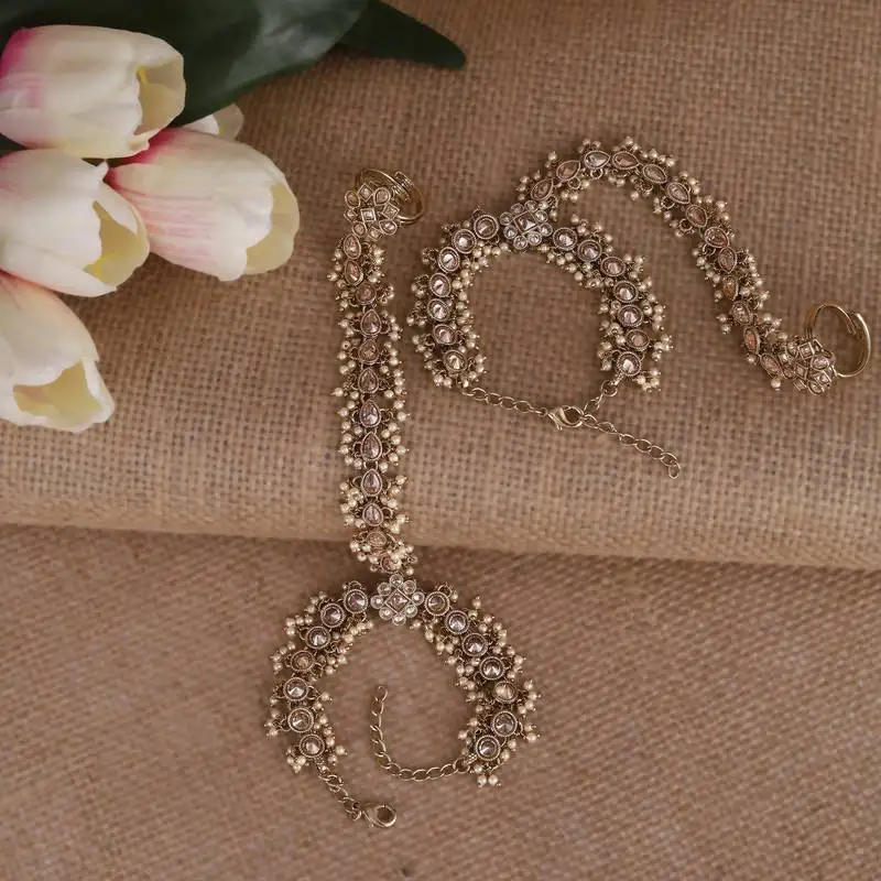 Traditional flower and oval design gold plated pearl set of 2 adjustable hathphool(panja) for women