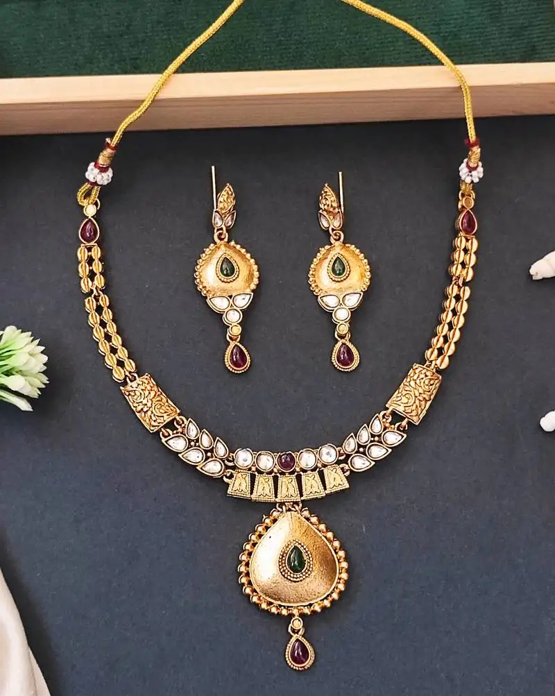 Antique finish tear drop pendant necklace with matching earrings