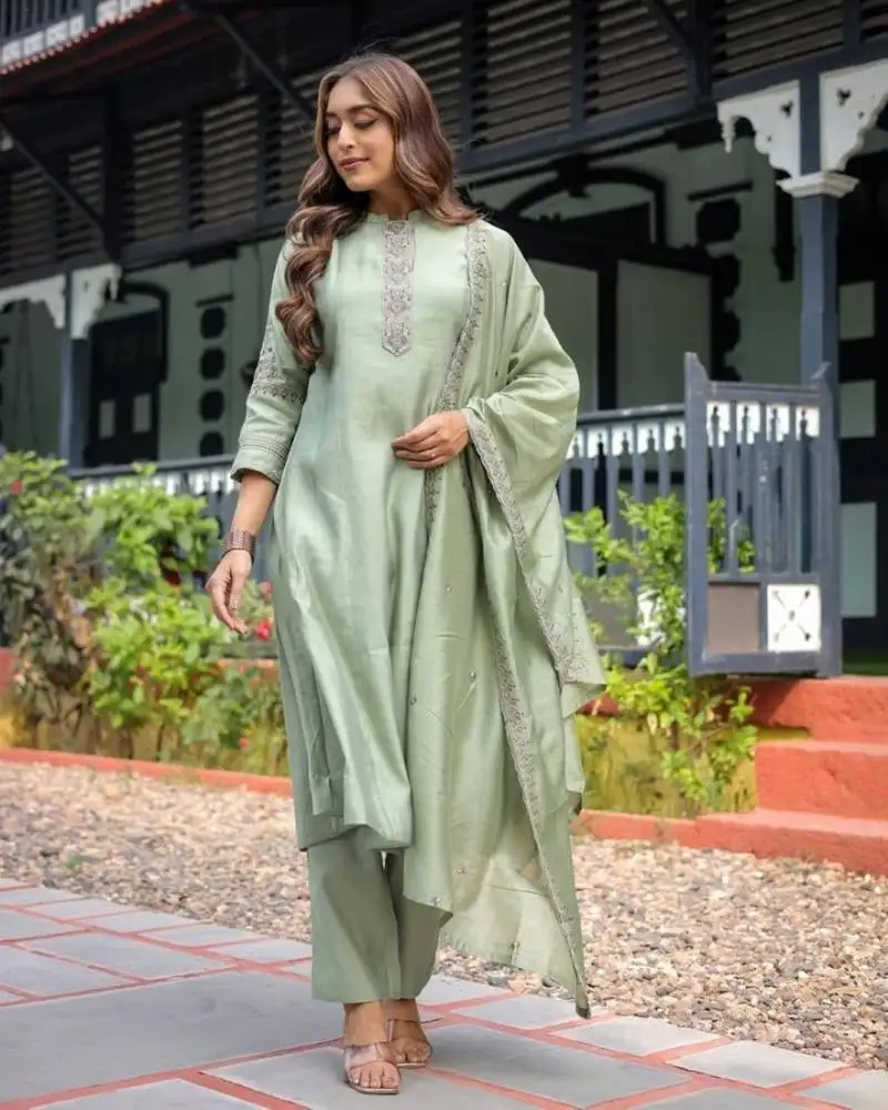 Green embroidered stitched silk kurta suit with dupatta