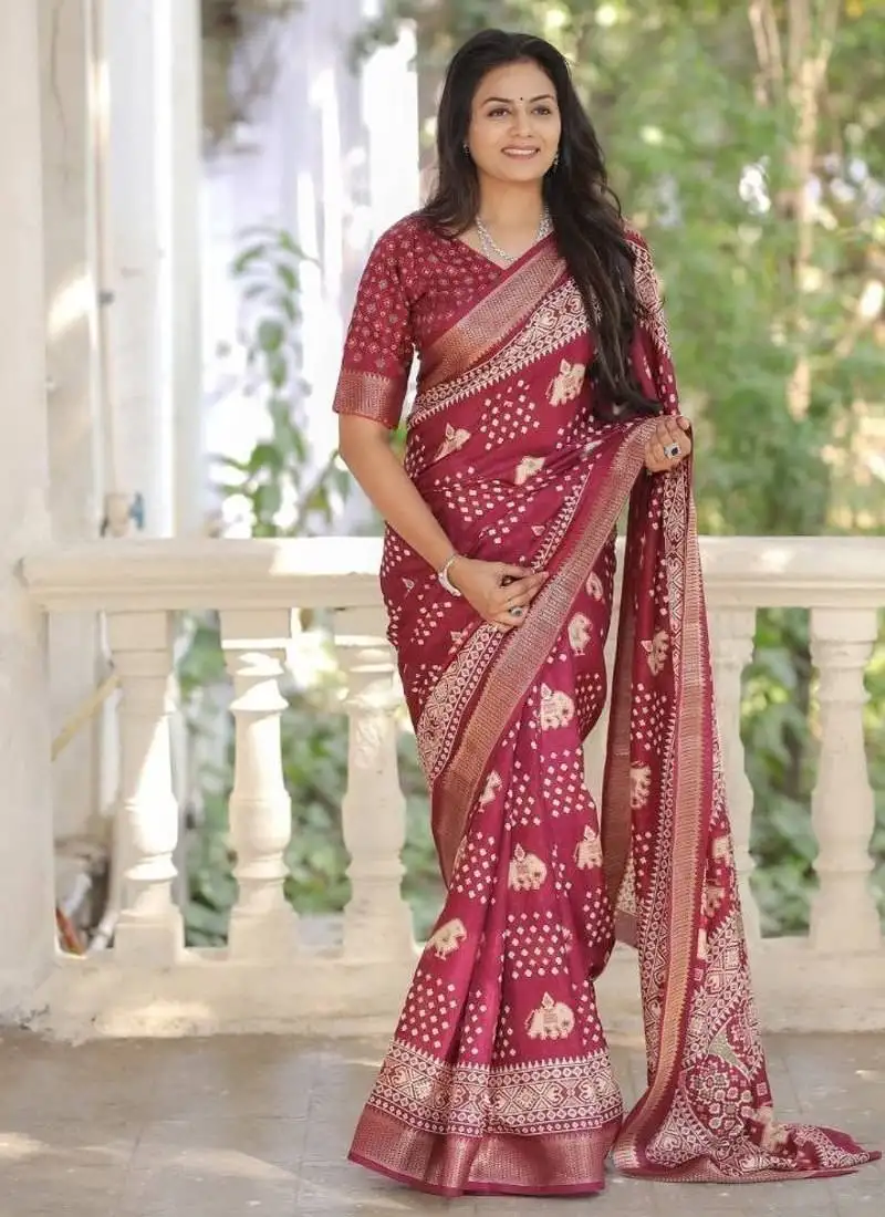 Maroon soft dola silk blend simple patola printed saree