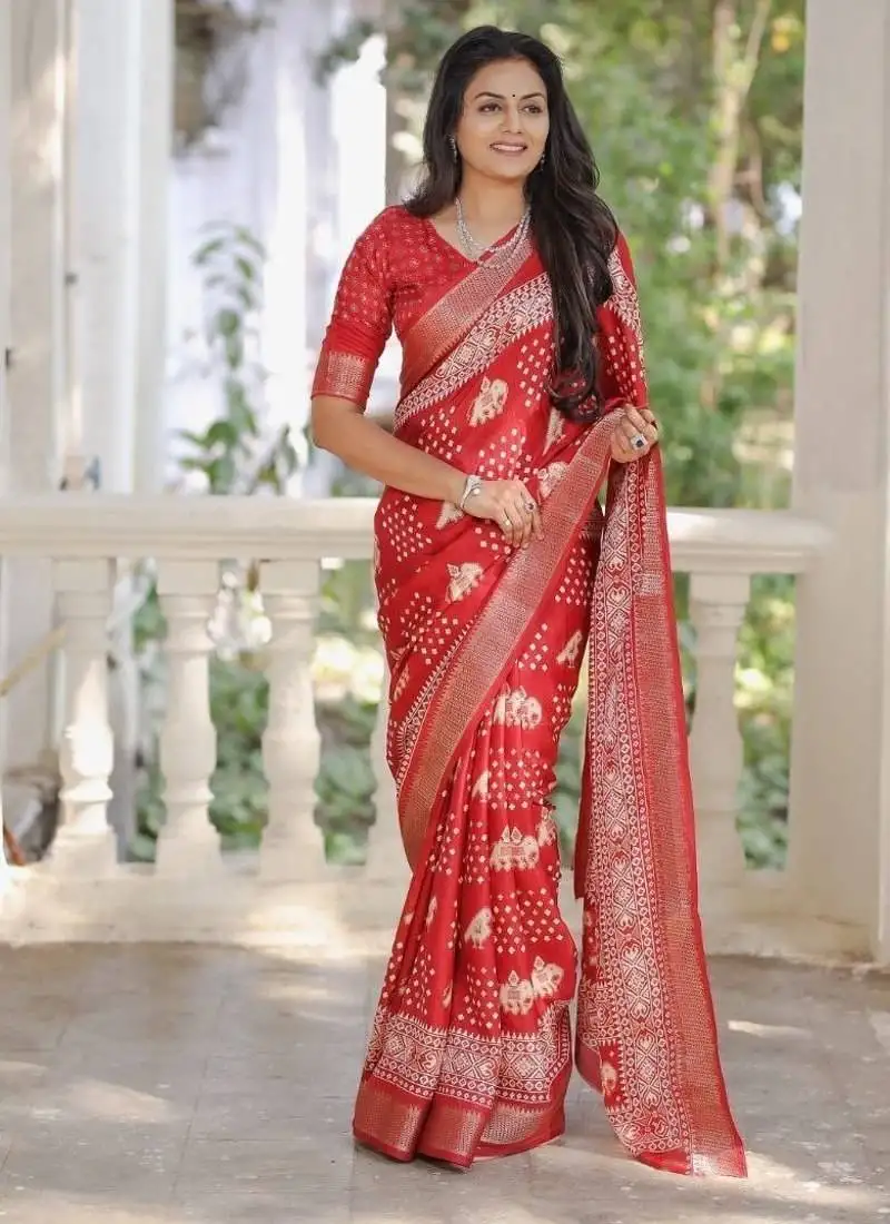 Red soft dola silk blend simple patola printed saree