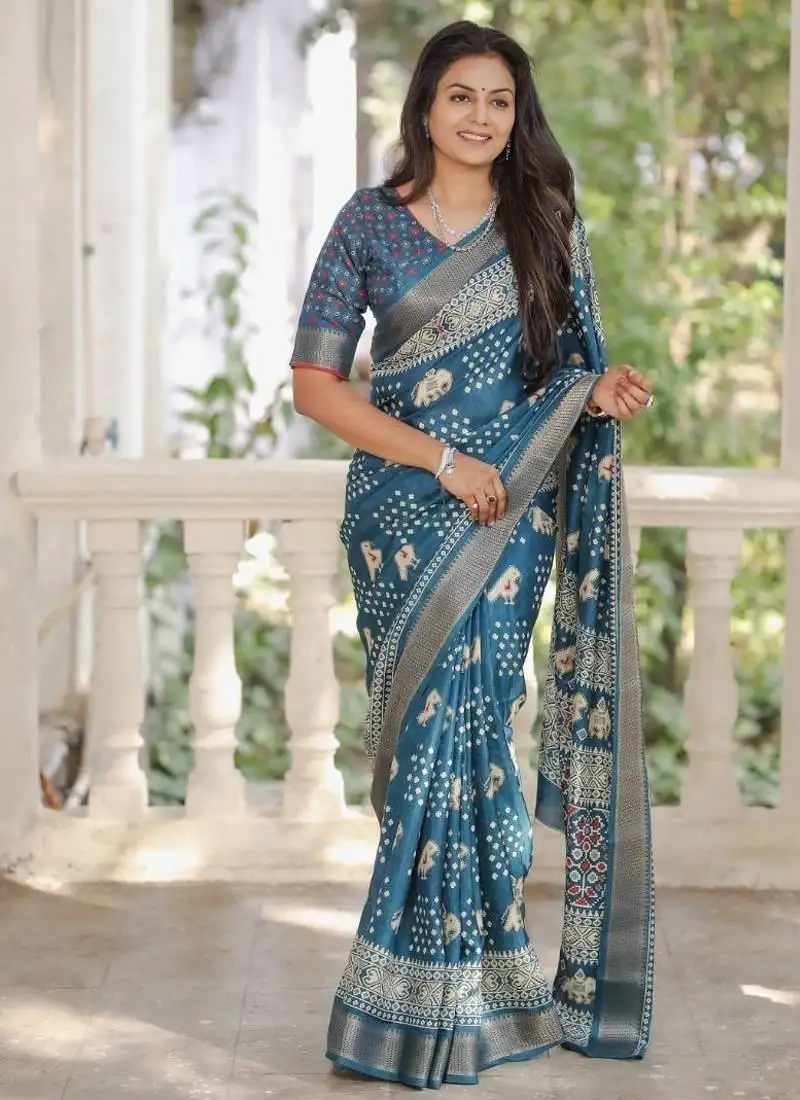 Blue soft dola silk blend simple patola printed saree