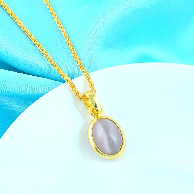 Brass gold chrysoberyll cats eye pendant