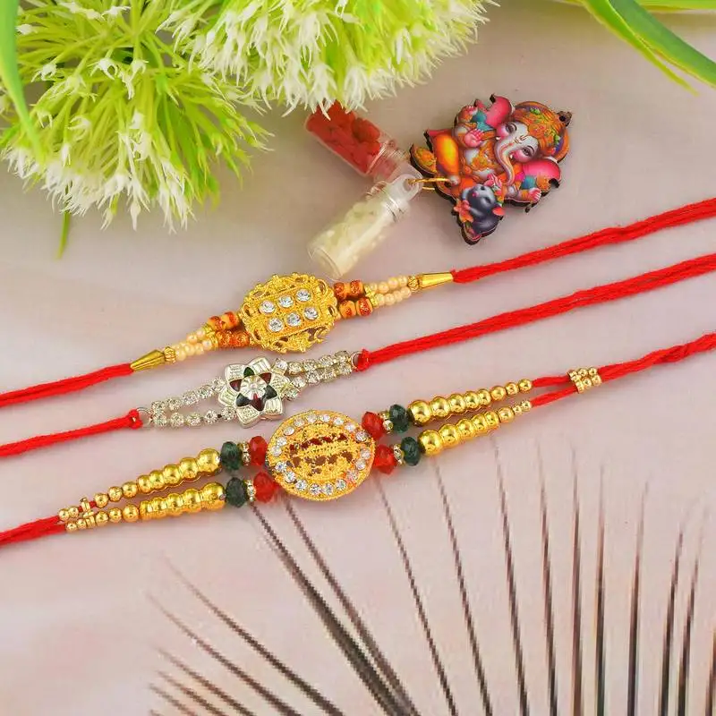 Rakhi for bhaiya bhabhi-2 brass gold plated and one pure silver (pack of 3)