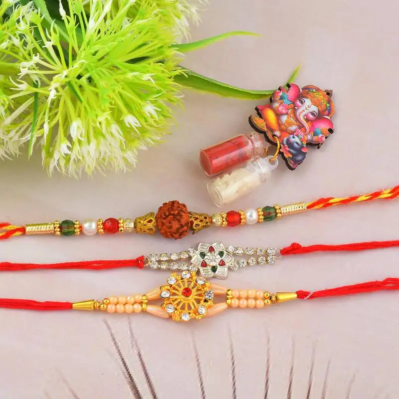 Rakhi for bhaiya bhabhi- brass micron gold plated, one pure silver with one rudraksh (pack of 3)
