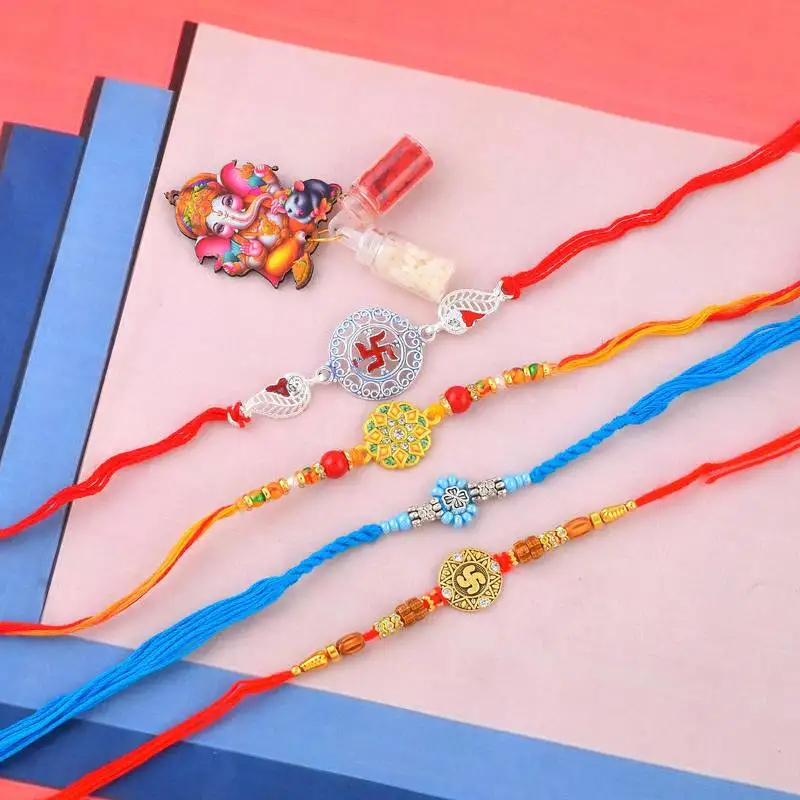 Pure silver and fabric rakhi for bhaiya bhabhi for rakshabadhan (pack of 4 )