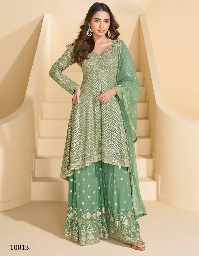 Dark green free size heavy georgette palazzo suits stitched