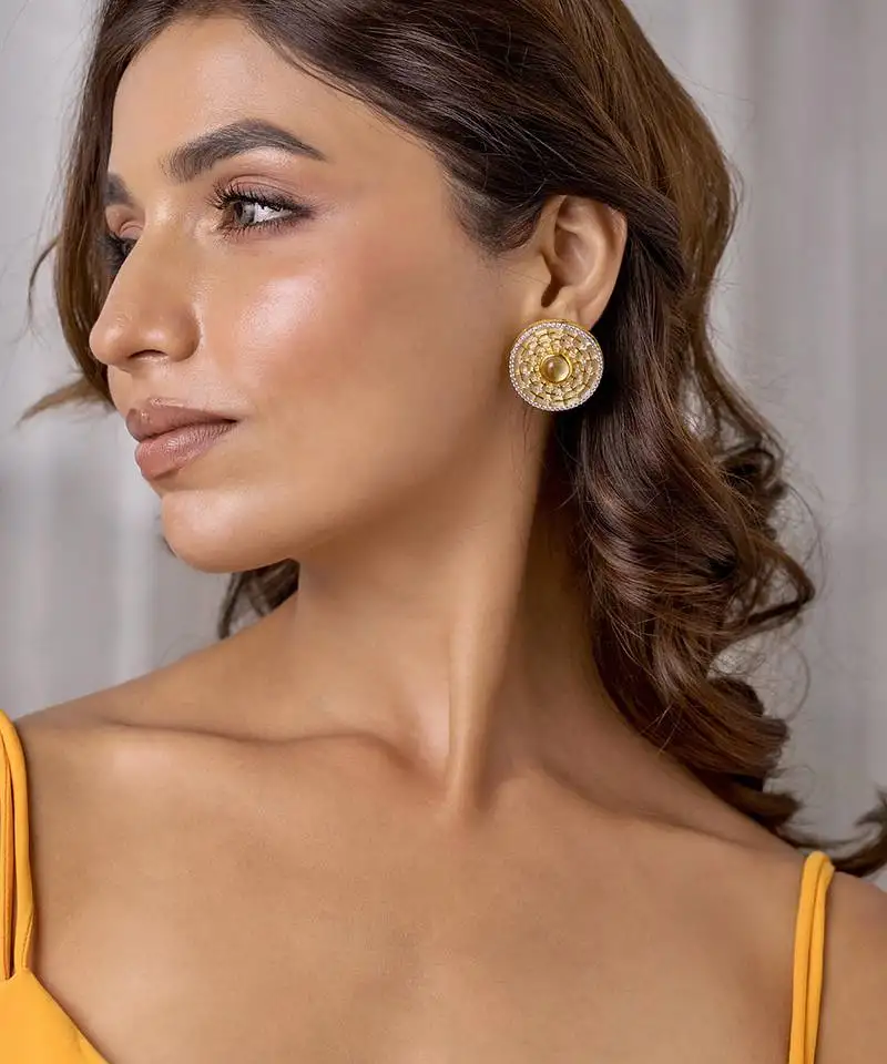 Gold mystical ear studs